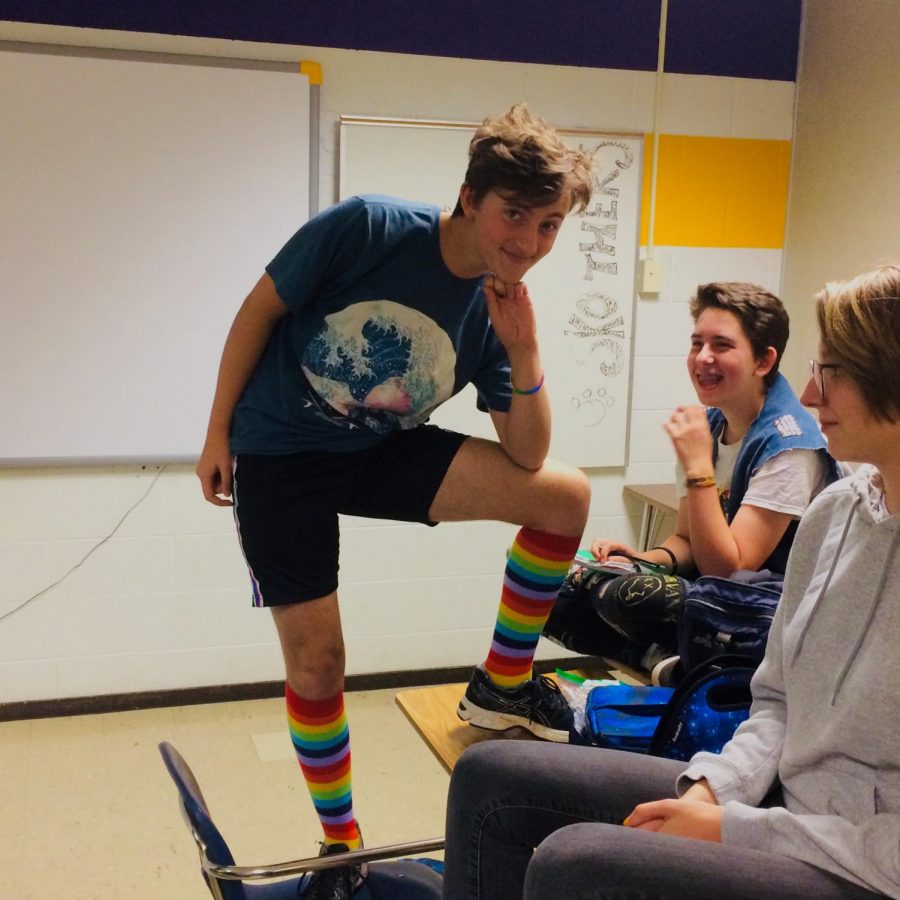 Sophomore Leo Servetar shows off his rainbow socks at a September GSA meeting.