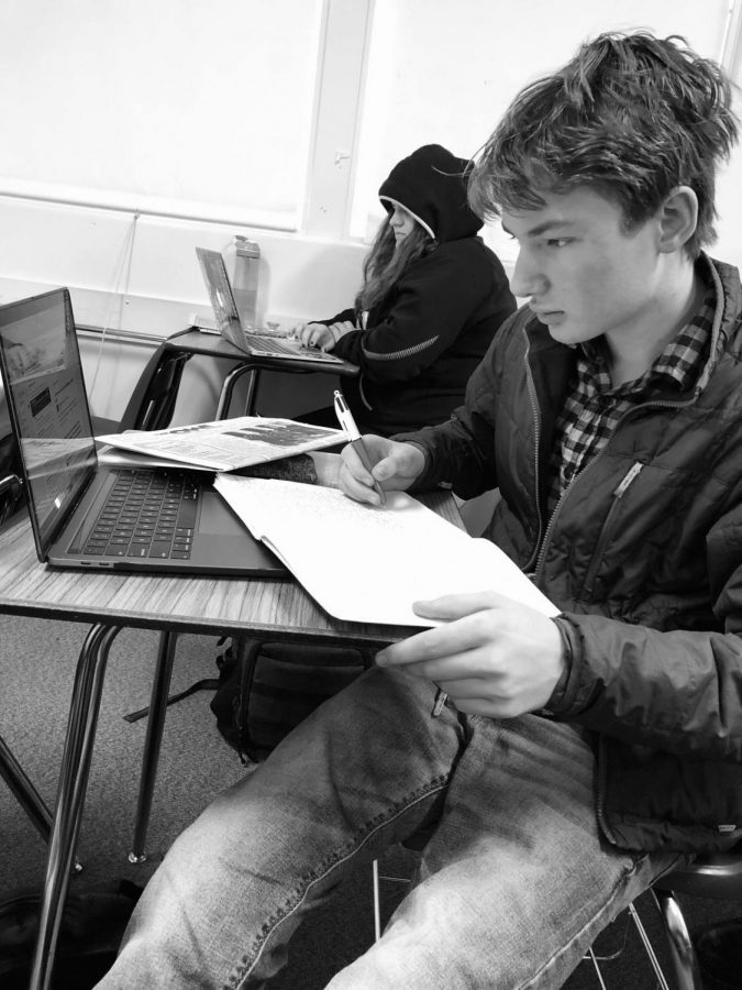 Students like Joe Mulligan start to struggle to stay on top of their work during second semester. However, it’s important that he stays on track otherwise he can fall behind and fail which could make colleges not accept him. Photo by Bryce Myers.