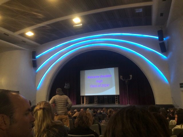 Gathered in Boulder Highs auditorium, incoming freshman and their parents buzz in anticipation for the start of the event. 