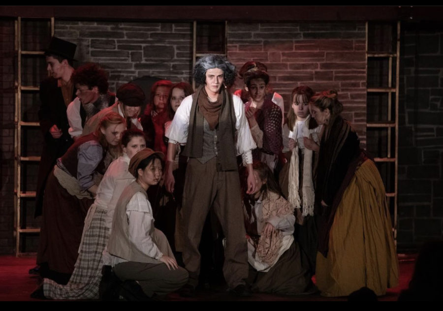 The chorus of Sweeney Todd during the musical number The Ballad of Sweeney Todd.