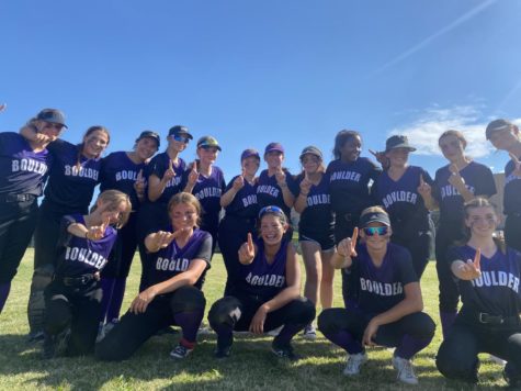 Varsity Softball, minutes before playing for their League Championship win. Photo by Samantha Green.