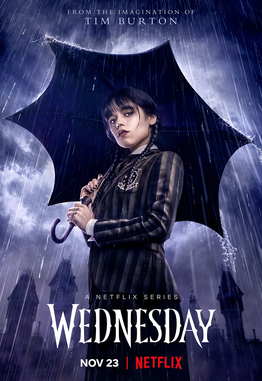 Neatly-kept, long, black, braids are a staple of Wednesday Addams’ original character. Licensed as a promotional image.