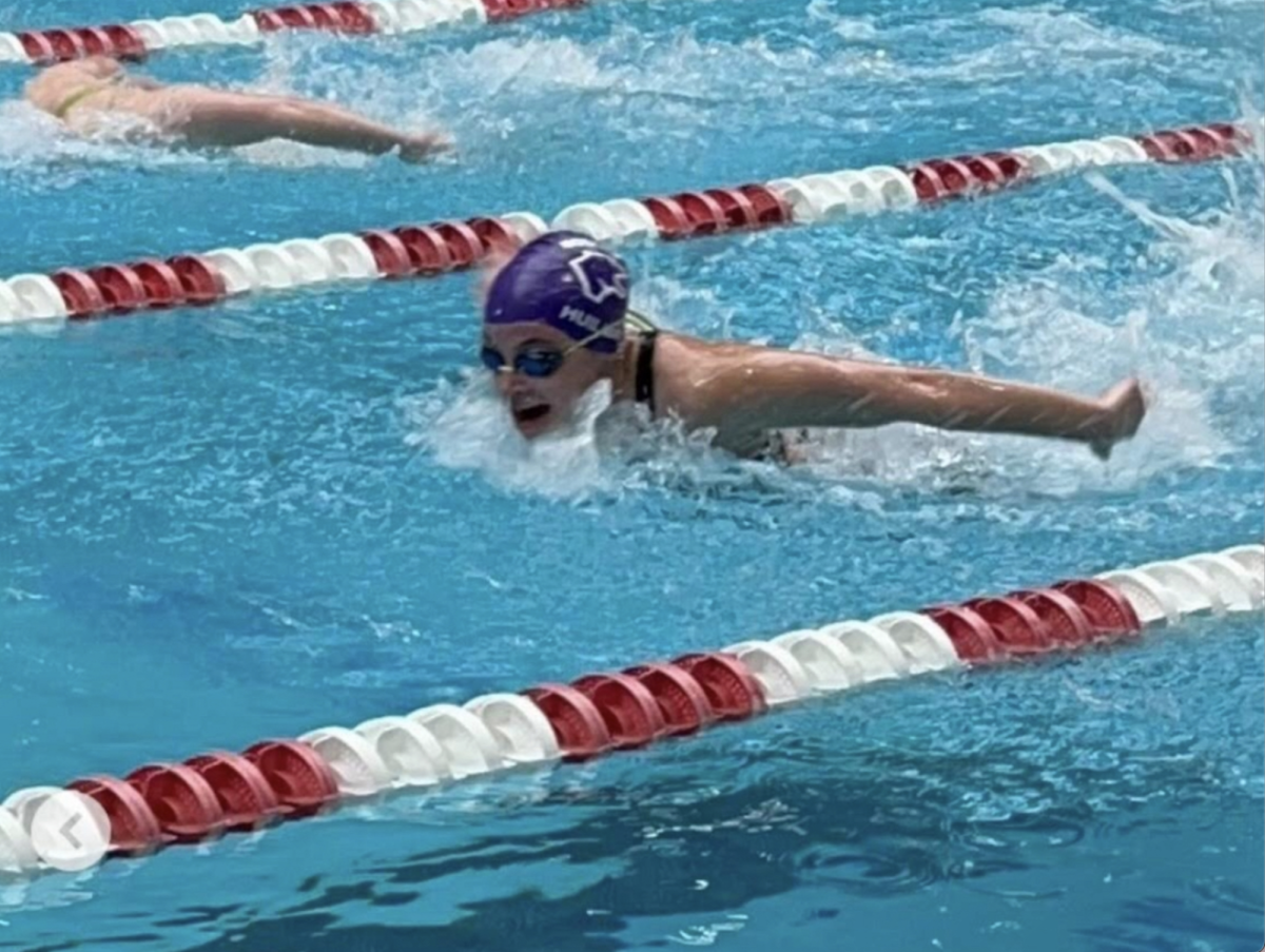 Hazel+Huliman+mid+race+at+the+statewide+meet+last+year+as+a+freshman.+In+this+meet+Hazel+finished+in+the+top+50+across+the+5A+class+in+the+100+breast.%0A