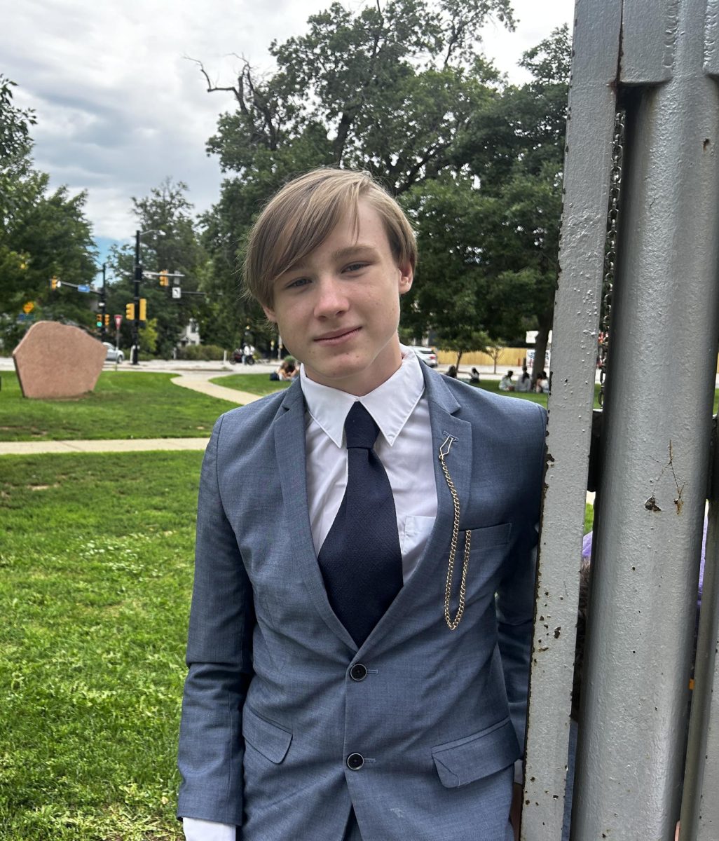 Student, Henry Barrett '24 carries a briefcase to school daily. His fixaton with dressy attire started in middle school.
