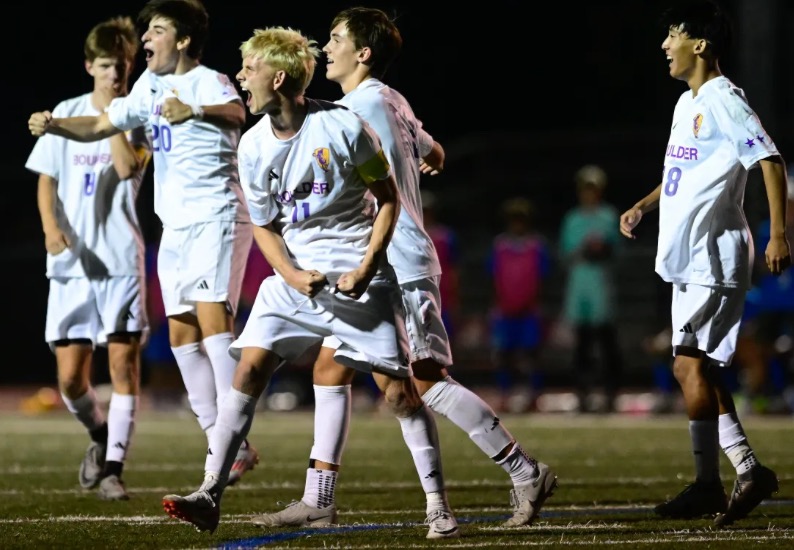 Xander celebrated with his teammates and the enthusiastic Panther's crowd after scoring 3 goals and helping the team beat the previously undefeated, Centaurus Warriors, 4-0.
