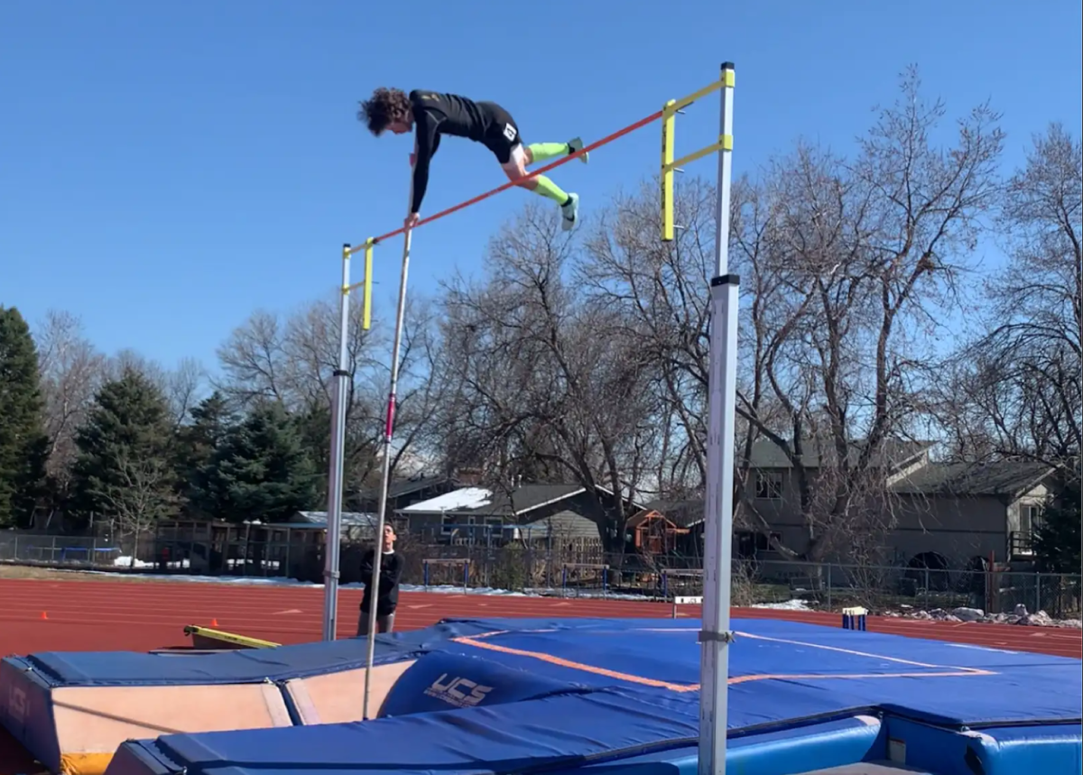 Cohen Janssen Roets clears a twelve foot bar at the quad meet on a pleasant and sunny day just before spring break!