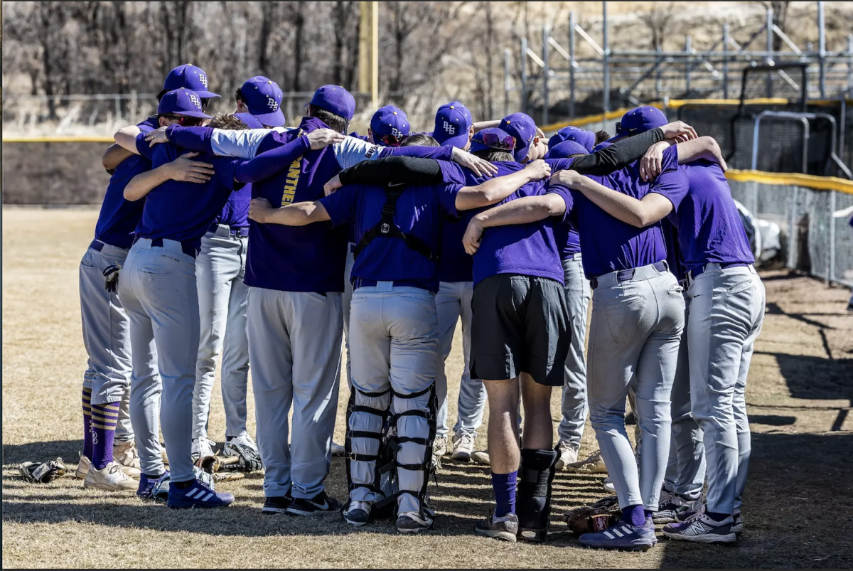 2026 Baseball Season Preview
In the abnormal heat of this year’s February sun, and its rising and falling, the seasons of Boulder High school’s sports teams continue their cycle. Winter sports conclude and athletes reap their rewards.  Now too, does the dawn rise as the members of the spring teams, and specifically, of the Boulder High School’s baseball team, begin their season with unshakable hope. 

In a fruitful discussion with Coach Whitehead, he carefully ascribes the season as having “a lot of potential, but that’s also what makes it nerve-wracking… because you have to achieve it.”

This potential which Coach Whitehead sees in the team is not just positive posturing, but rather from his own observation of all the players’ strong determination, and the shared bond with each other.  With a confident enthusiasm, Whitehead added, “We have a small senior class, but they’re tight-knit, which makes it really fun. This is their 4th year in the program. They bought into what we’ve wanted to build here, and you can see it coming to fruition.” 


In this atmosphere of community, Coach Whitehead observed how  “the team enjoys being around each other and enjoys playing the game together and that is when things get exciting.” To me this struck as a plainly concealed truth we often forget, how community and finding joy, in a sport, or any activity, can make discipline and ambition far easier. On the same note catcher Sam Skubic ‘27 adds, “I feel great when I play. It is such a great feeling to be able to play with and around my best friends and I am so blessed to be on such a fun and high quality team.” As Skubic puts it, this makes it easier for him to “put a lot of work into the preparation [leading into the season].” 

In this way playing baseball or any sport can be important for developing life skills as Coach Whitehead describes how the baseball team had to learn “not to have a sense of complacency, and that’s just in life. Sports allow us to see [ourselves] day in and day out because you have to go compete against another team and if you are complacent, the result of that competition is you get your tail whipped. There is immediate feedback.”

In regards to this year's team Coach Whitehead remarks, “...this group has learned to identify [this sense of complacency] when it comes up and I think that is a huge step in maturity.”

I then asked Coach Whitehead, about the environment on the team, and he looked up at the ceiling, and then the chair, and then to me said, “The guys understand that they are powerful, loving and self-disciplined, that they influence people on their team with their actions. They love their teammates hard, which means they not only celebrate their highs, but they’re with them in their lows. They’re truthful when they need to be truthful, and they’re self disciplined because they’re willing to be. To me, I think baseball is the most beautiful sport because you get to see the pinnacle of individual competition, but more importantly, you are competing as a team. Each piece is valuable, and if you have one out, the whole thing is thrown off.”

Baseball is about life, just as much as to some of these guys, life is about baseball. I saw this because a sport such as baseball, in which each individual plays an important role, trains players how to live beyond  the field. As Coach Whitehead points out, “The immediate is wins and losses in the field but the long term, is wins and losses in life. I just love to see my guys succeed, which is so exciting.”

Last season there were some injuries and the team has addressed them by changing the way they train, and by hiring a BHS baseball alum who used to work as a PT pitching coordinator with the Mariners, who Coach Whitehead praised as "being a big part of our health success right now.” With help of PT and bringing more balance, Skubic reflects on the team’s injury bug last season, professing, “I believe we will come out stronger this year knowing how to take care of our bodies and the methodical work it takes to be great. This year more than ever we understand how to be ‘masters of the boring’ and put in the daily work to be successful. Our injuries as a team really opened our eyes to that.”

And as to the aforementioned great hope, Coach Whitehead, told me, “No matter what’s going on, they are going to fight hard for each other, and they hold me to a high standard as much as I hold them to a high standard.” With Coach Whitehead at the helm, the Panthers are set up to have a good 2026.
